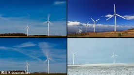 蓝天下的风力发电风车视频素材