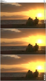 情侣海滩看夕阳
