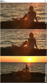 美女海边看夕阳