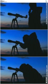 男人用天文望远镜观看天空