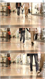 情侣手牵手逛商场