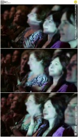 电影院美女看电影鼓掌