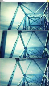 在大桥钢架下行驶