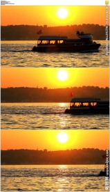 夕阳下游艇划过