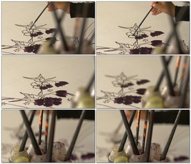 聚焦镜头拍摄蜡染画作画过程