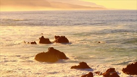 海洋日出礁石海岸线