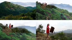 山顶画画的小女孩