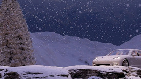 在下雪路上行驶的跑车