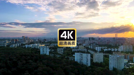 航拍素材城市群上空夕阳云海