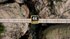 短视频素材唯美航拍峡谷浮桥