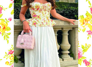 复古风女子持粉色手提包